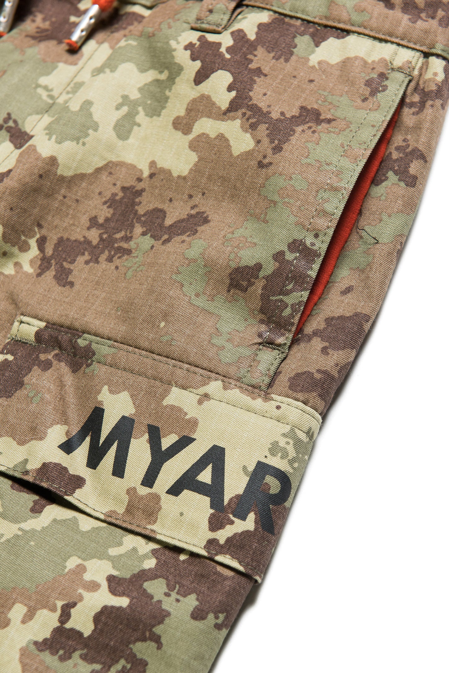 Orange fleece and camouflage fabric pants