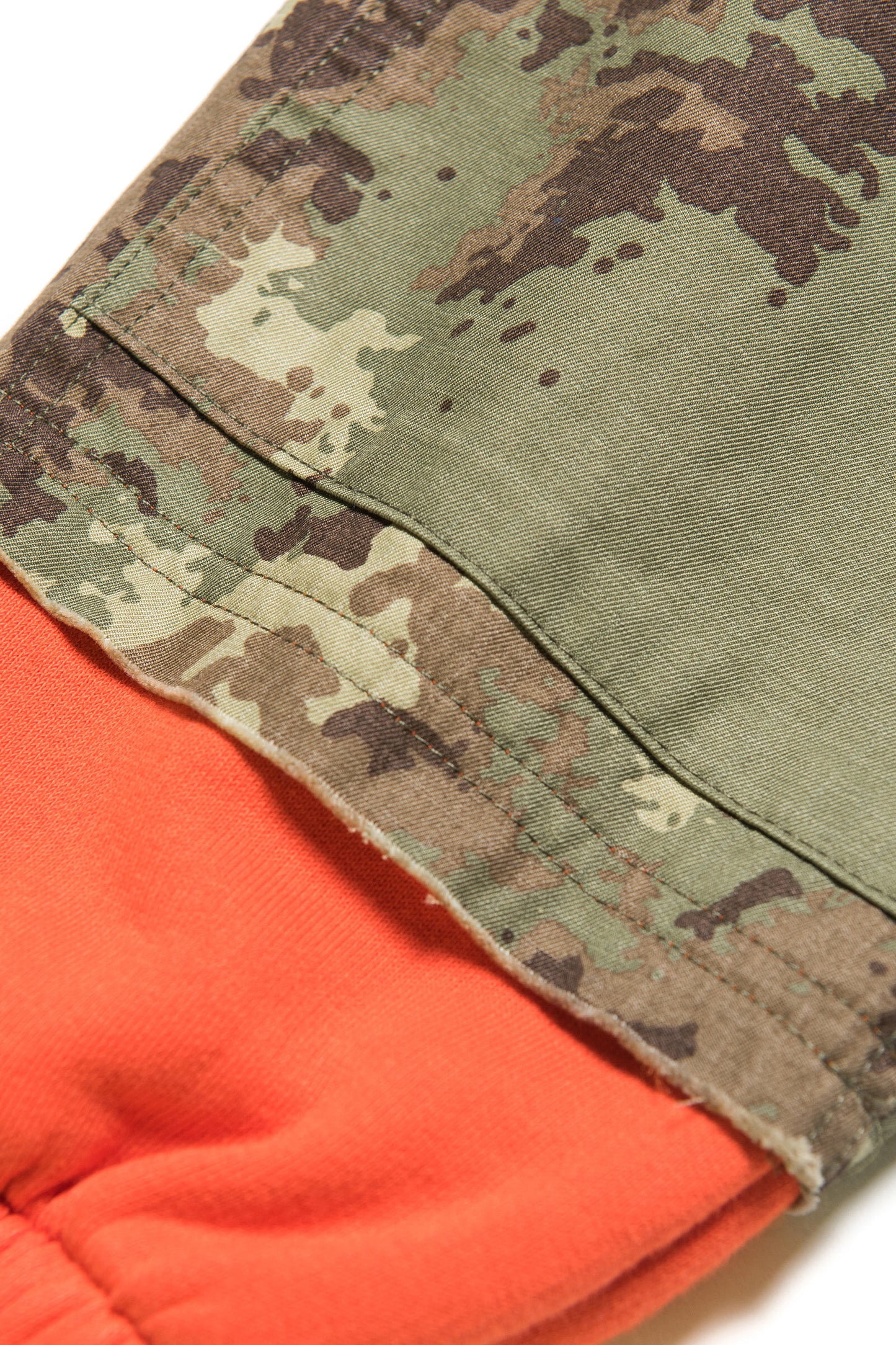 Orange fleece and camouflage fabric pants